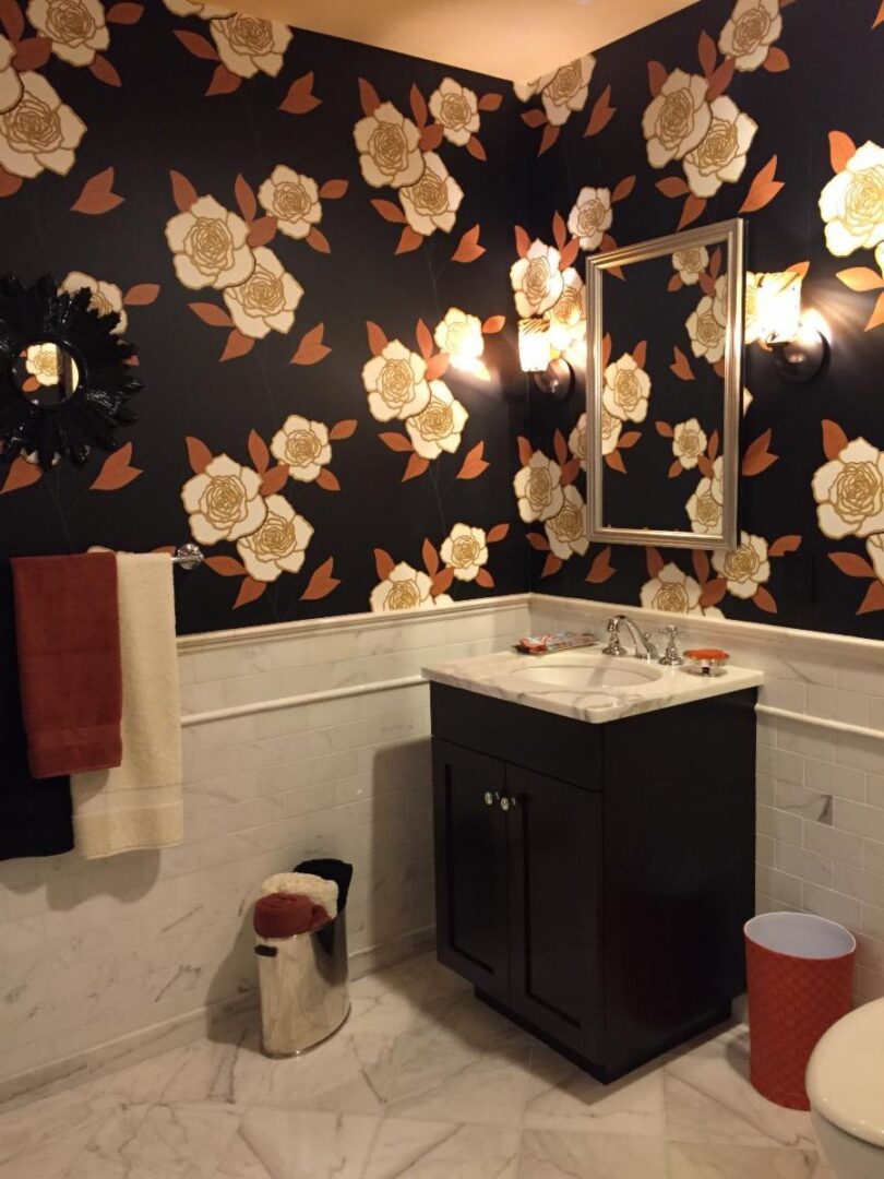 Decorate a powder room with dramatic wallpaper that has large and colorful designs. You're only in it for a few minutes, so make it into a treasure box!